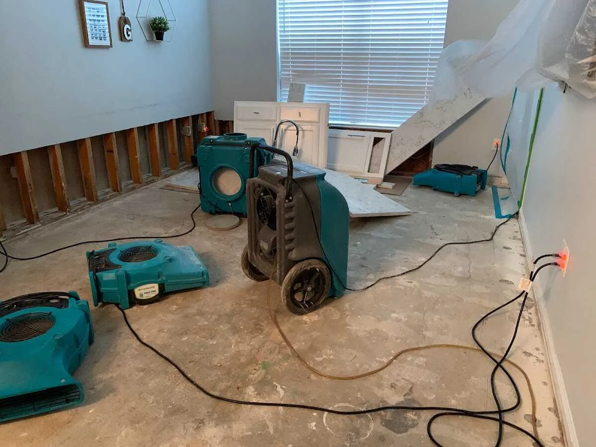 Dehumidifier in flood-cut room for Water Damage Restoration in Jurupa Valley
